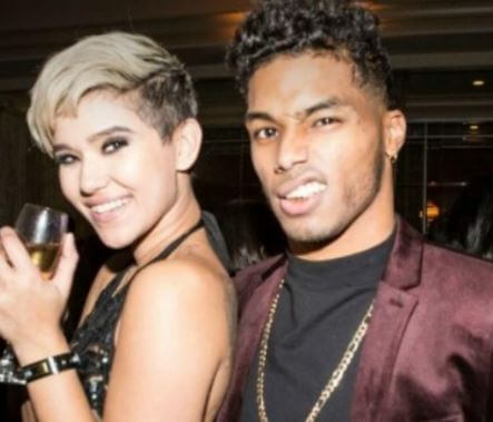 Nickey Alexander son Rome Flynn with Camia Marie in an event.